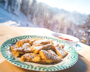 Kaiserschmarrn with jam and a view of the ski area