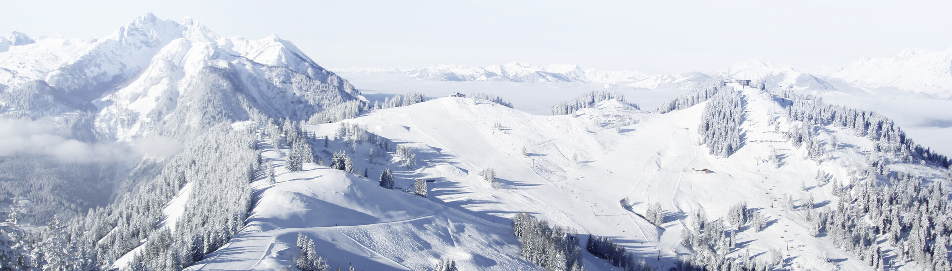 Snow-covered landscape with Hirschkogel and Gernkogel mountains in St. Johann-Alpendorf at Snow Space Salzburg ski resort | © Snow Space Salzburg