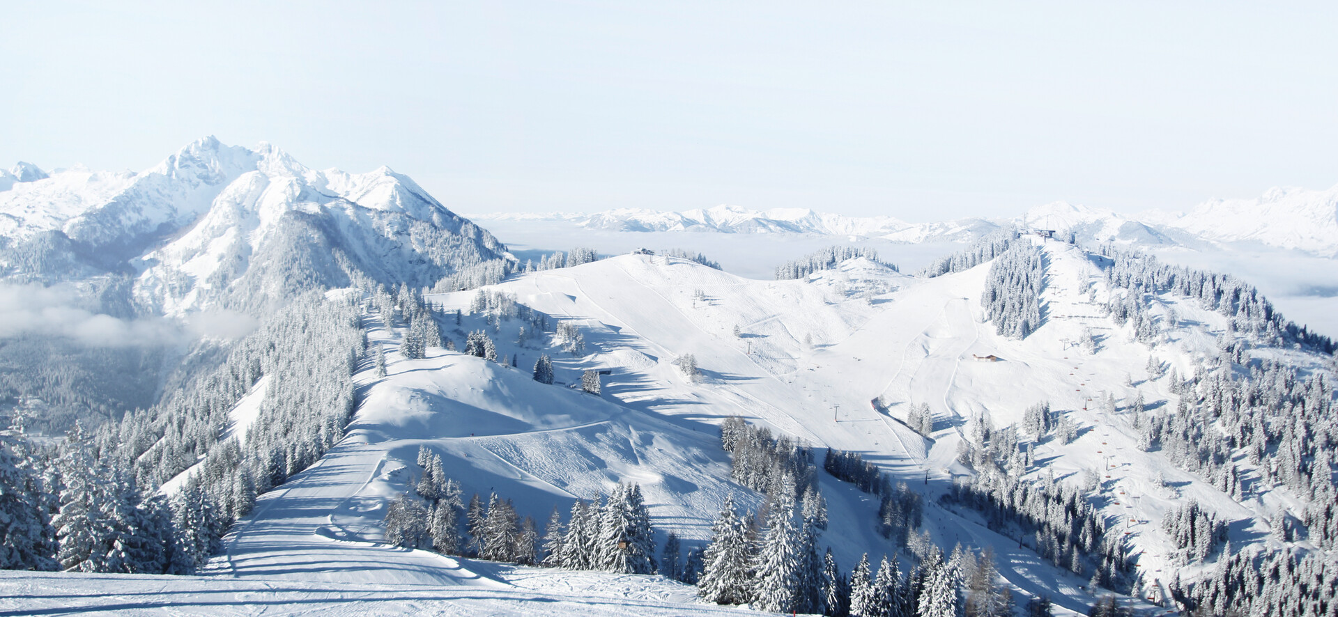 Snow-covered landscape with Hirschkogel and Gernkogel mountains in St. Johann-Alpendorf at Snow Space Salzburg ski resort | © Snow Space Salzburg