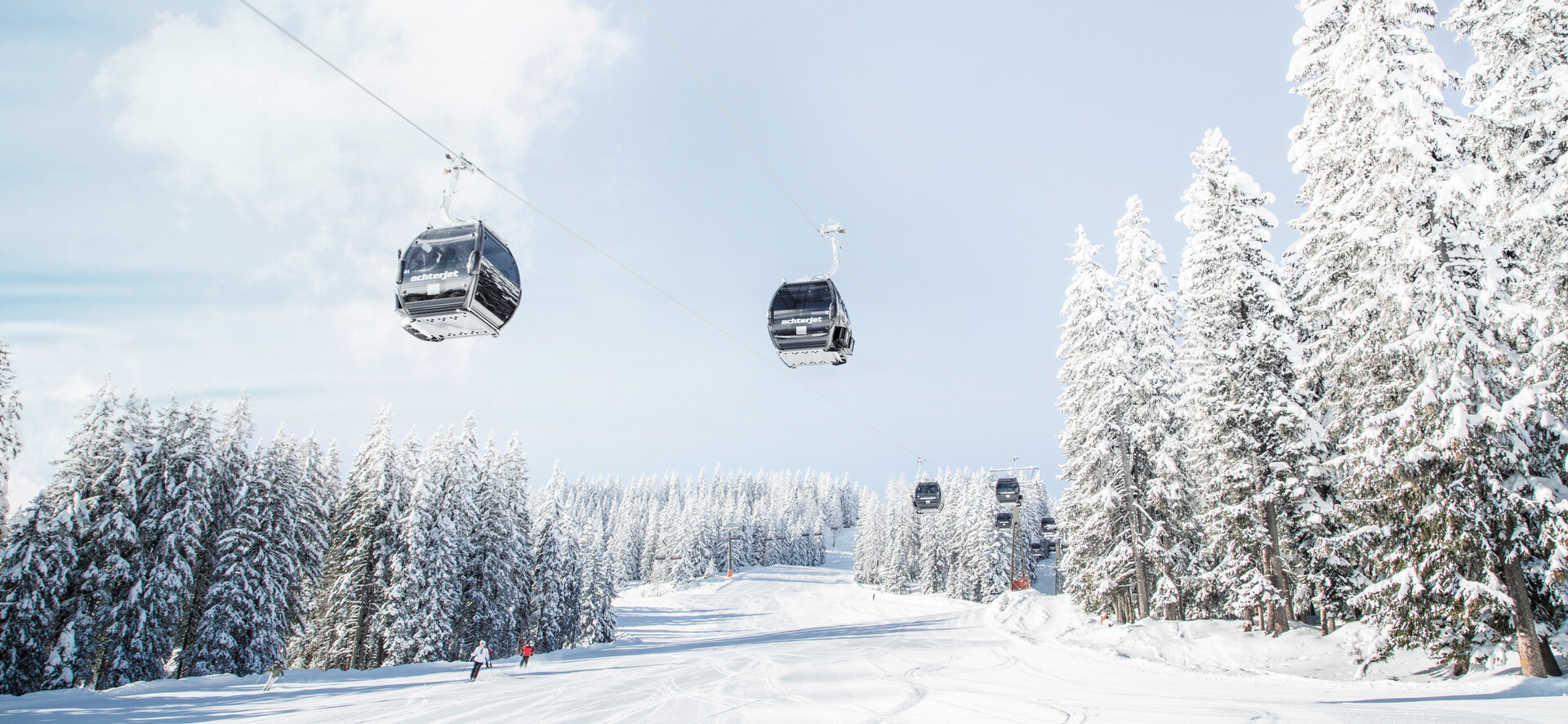 Gondel im Skigebiet Snow Space Salzburg über der Piste in Flachau | © Bergbahnen Flachau GmbH
